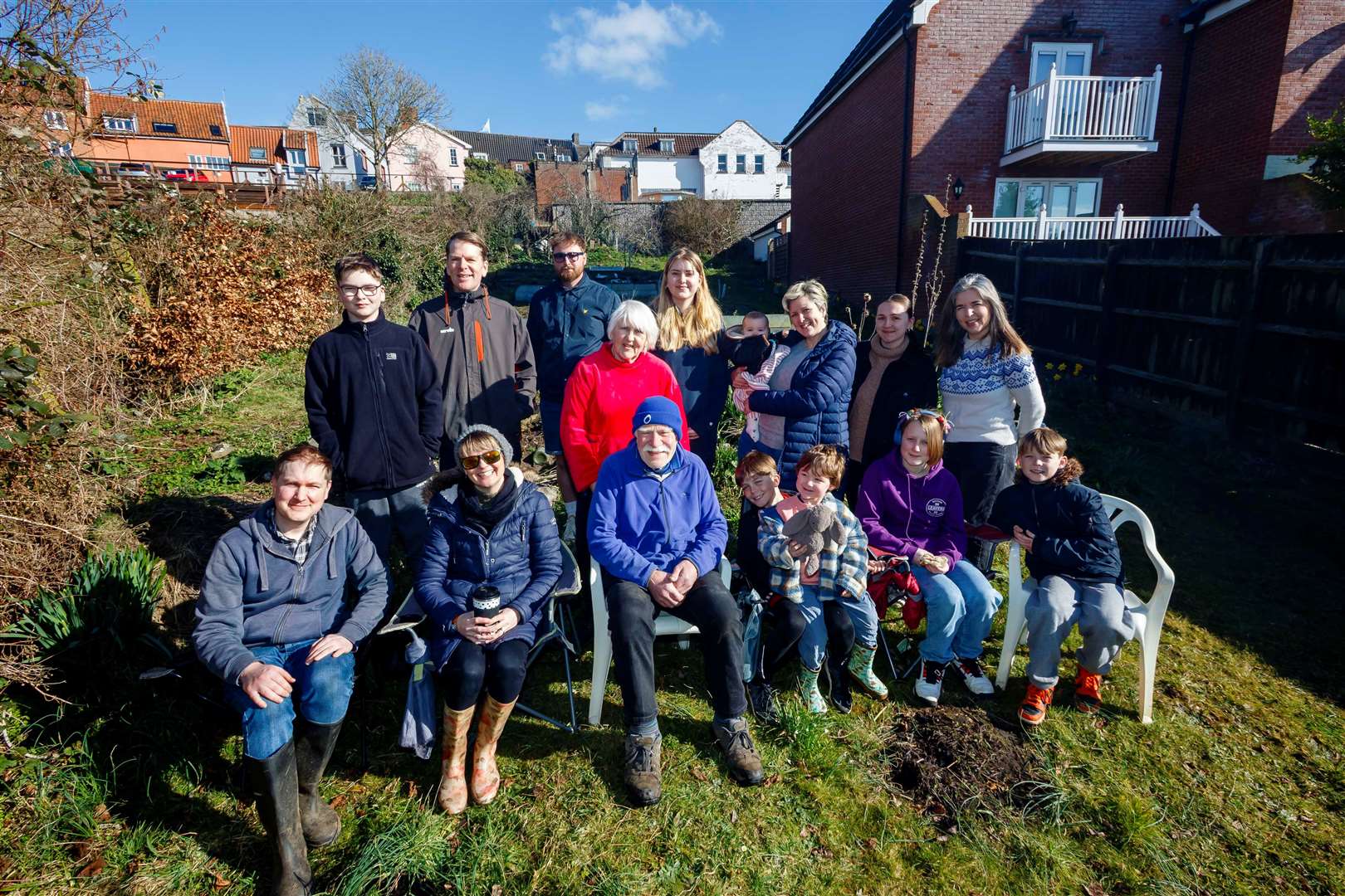 Mark and Paula Aiken (centre) surrounded by their family. Picture: Mark Bullimore