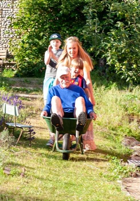 Due to the plot being sloped, a big family tradition at the plot was wheelbarrow riding. Picture submitted