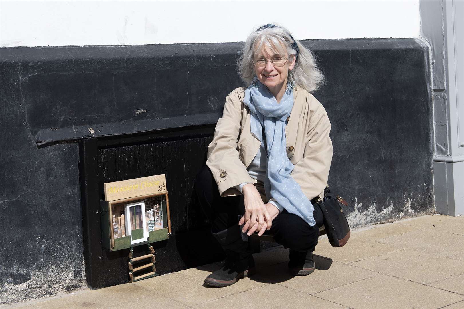 Eileen Ryan shows off one of the miniature mouse shops, which will be dotted around Harleston. Picture: Mecha Morton