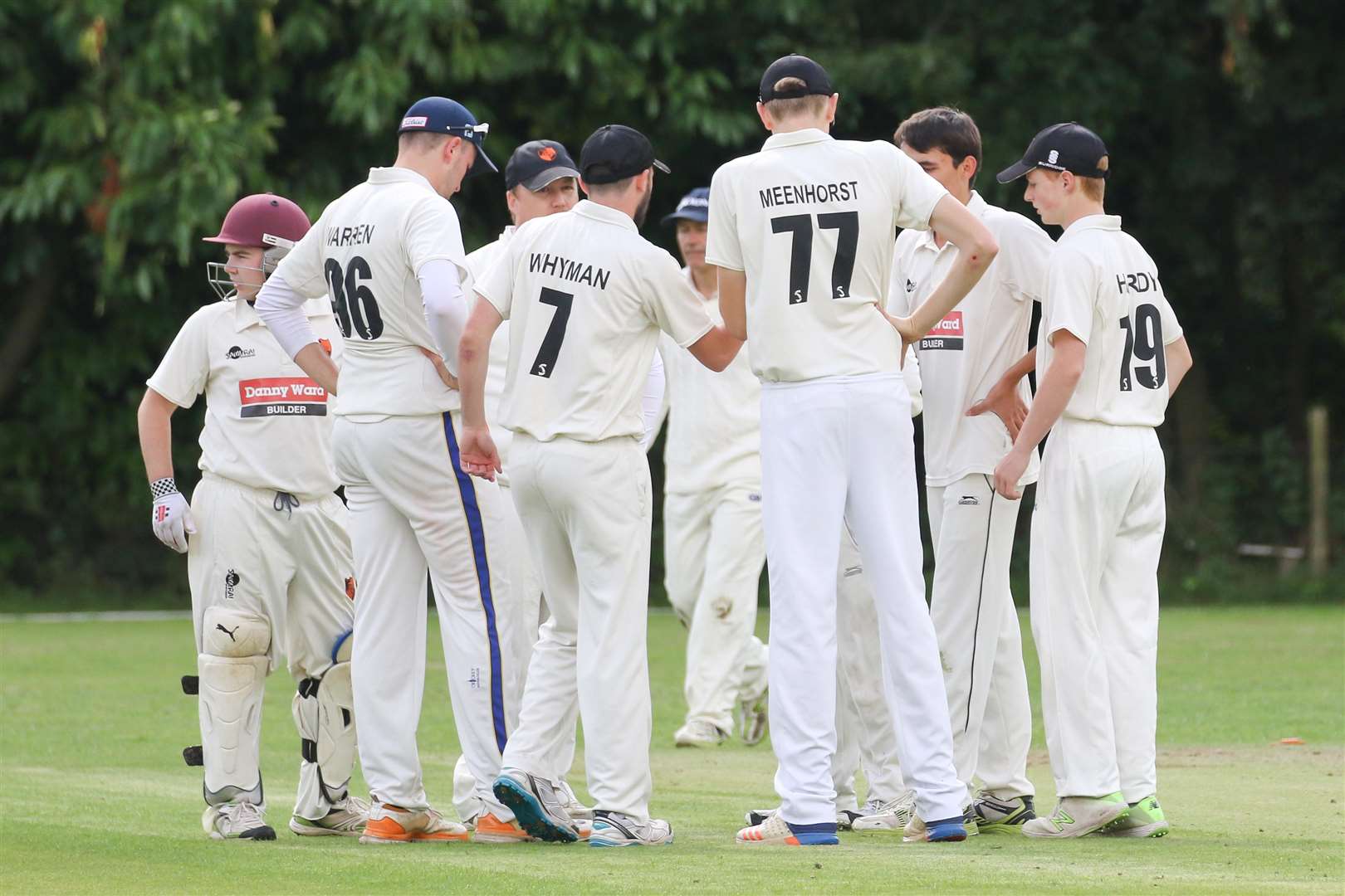 KEY WICKET: Diss Cricket Club discuss their next move after capturing the key Old Buckenham wicket of Ben Shearing, as they took six wins from seven to end their season