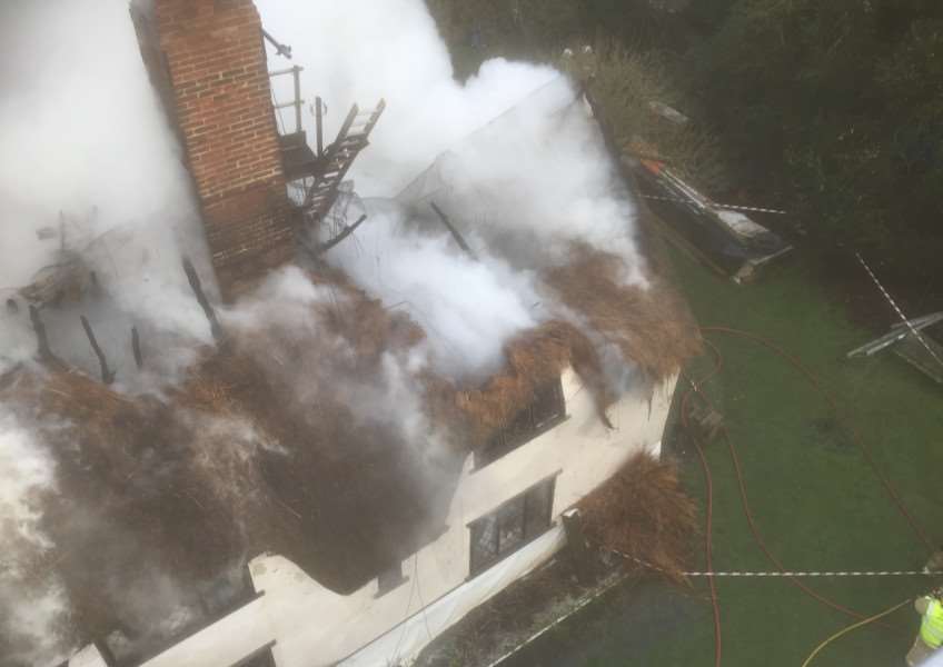 The fire ripped through the cottage's roof ANL-160122-110645001