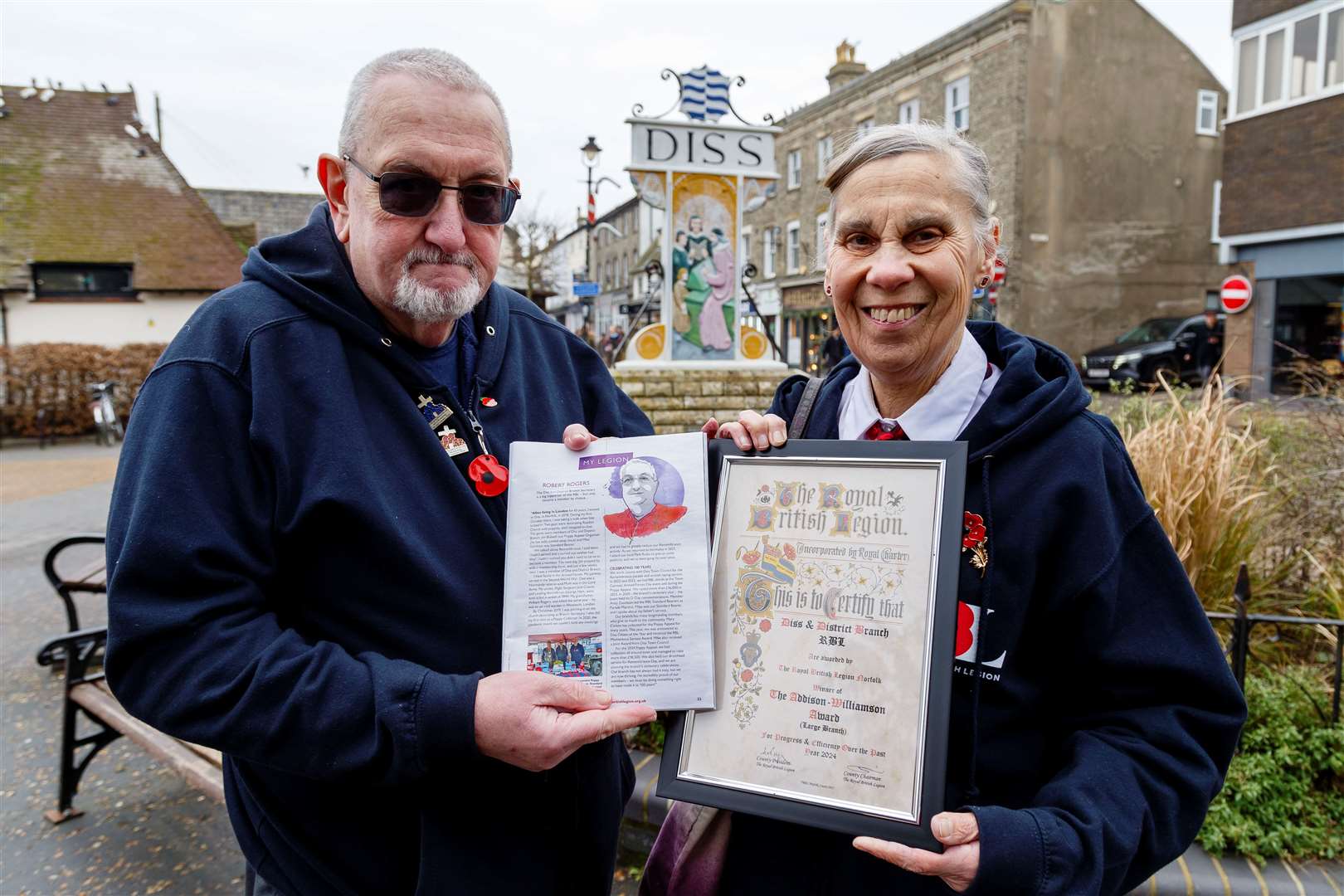 Branch secretary Robert Rogers and committee member Mary Cotton show off the certificate and RBL magazine. Picture: Mark Bullimore