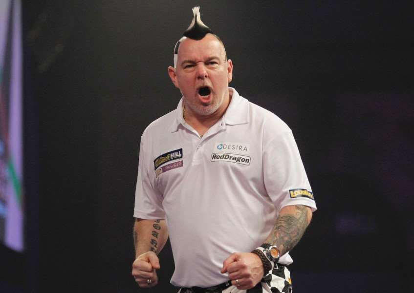 OFF AND RUNNING: Peter Wright overcame Jelle Klaasen in his first match of the 2017 Premier League Darts. Picture: Lawrence Lustig