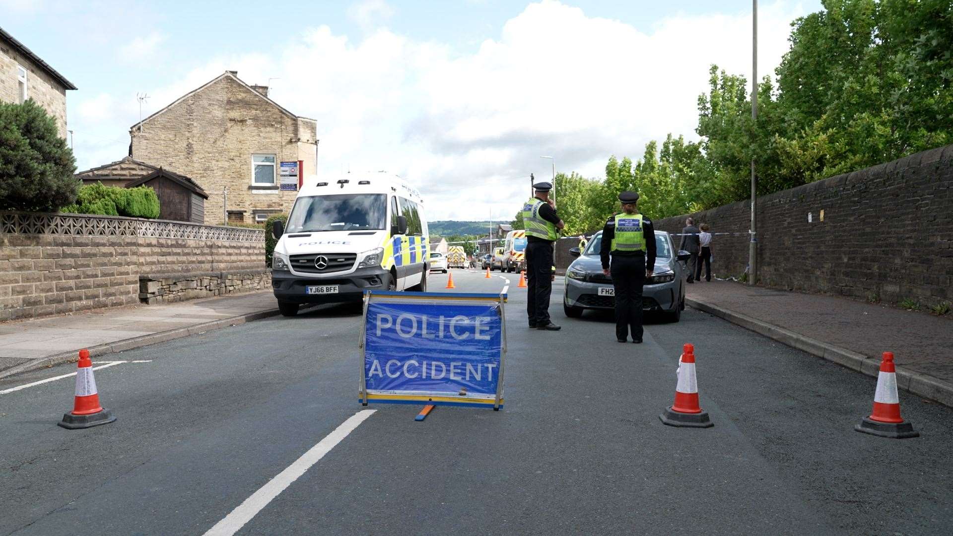 Police assisted with closing the road and evacuating residents from homes on the street (Richard McCarthy/PA)