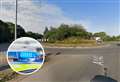 Busy road shut after lorry overturns on roundabout