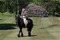 Queen pictured riding pony in first public appearance since lockdown began