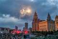 Man arrested on suspicion of arson after firework thrown at Liver Building