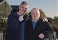 Boxing champion pays visit to sports bar