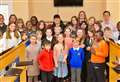 WATCH: Ed Sheeran surprises young choir to open church’s new song school