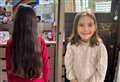 School girl is cut above after helping two charities with a haircut