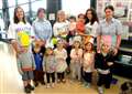 Jolly Tots of Diss toddle through town in aid of Barnardos