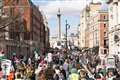 Palestine supporters march through central London