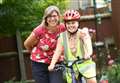 Animal lover Lily takes to the roads to help fund zoos 