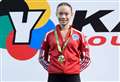 Daughter of couple who closed their restaurant to focus on her karate career wins gold for England