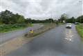 Major road partially blocked after crash between motorbike and car
