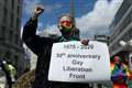 Campaigners march in London as main Pride celebrations move online
