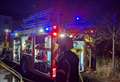 Two cars parked behind a village property were set alight in the same incident