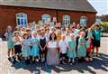 Village primary school celebrates double award win