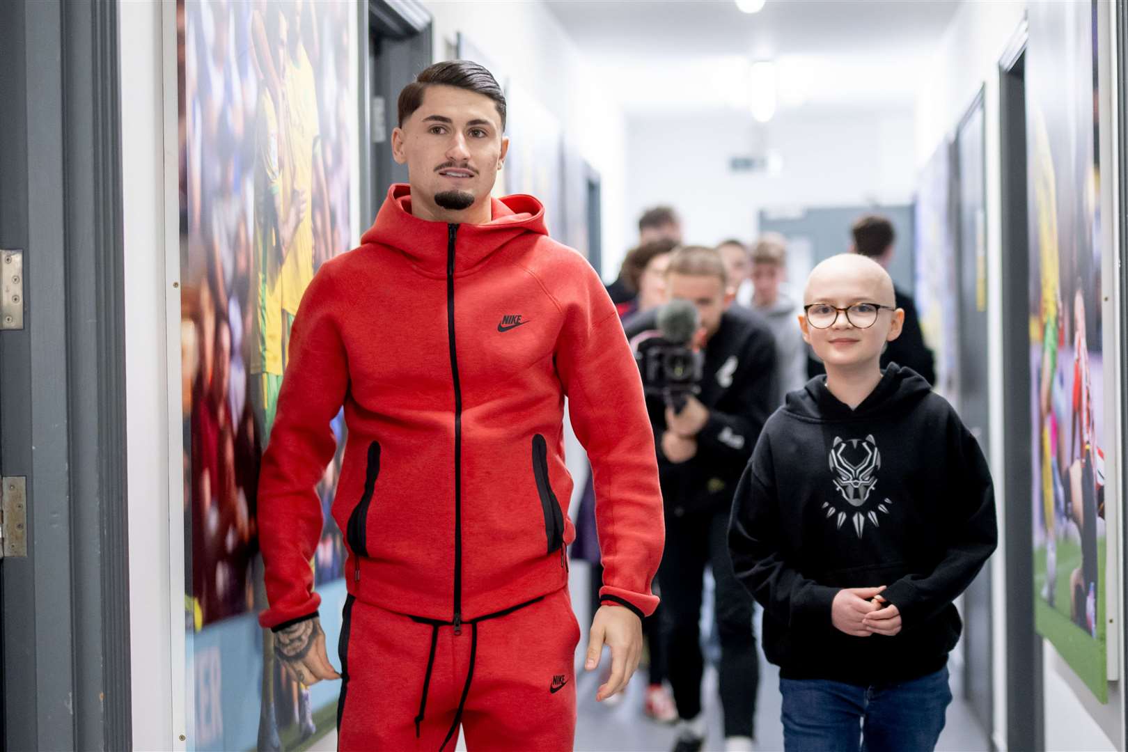 Borja Sainz showed Albert and his family around the Norwich City Avant Training Ground. Pictures: Norwich City/Matthew Usher
