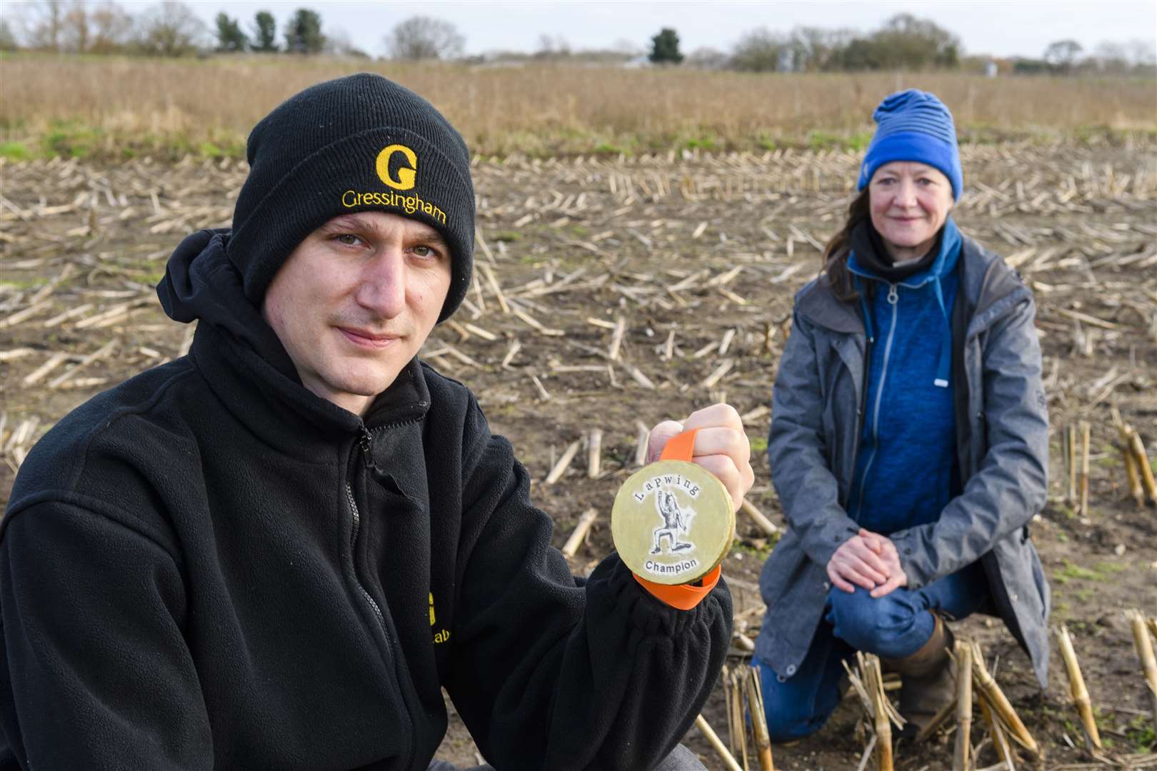 George Seinet (left) holding the medal given to him by Juliet Aster (right). Picture: Mark Bullimore Photography 2022.