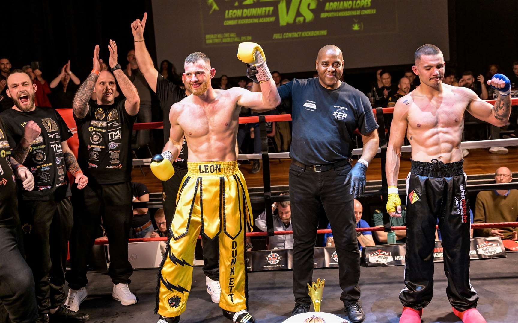 Leon Dunnett (left) is declared the winner of his world title fight after the bout went the distance in Birmingham Picture: Michael Ault