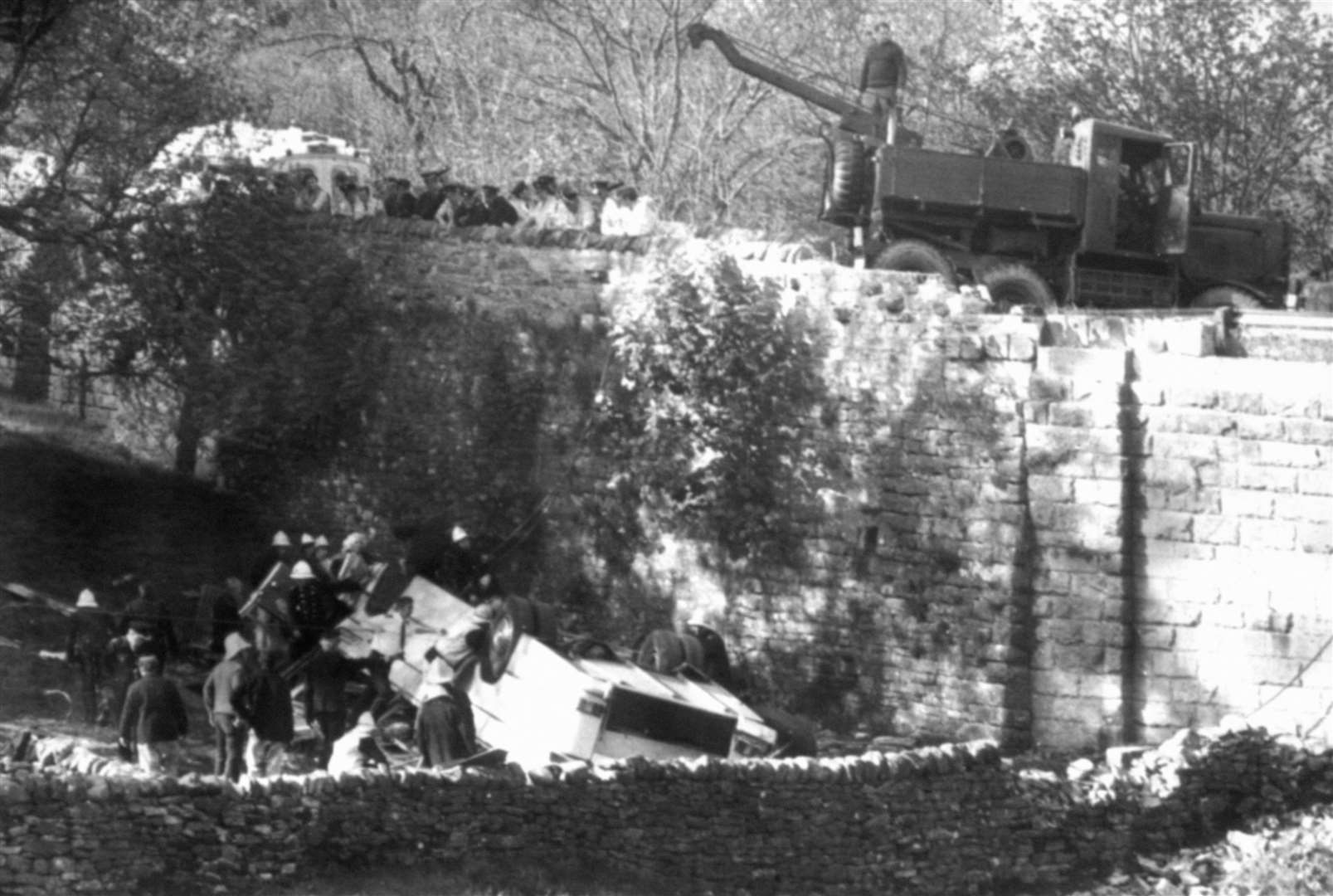 The coach plunged nearly 20ft into a field and rolled onto its roof (PA Archive)