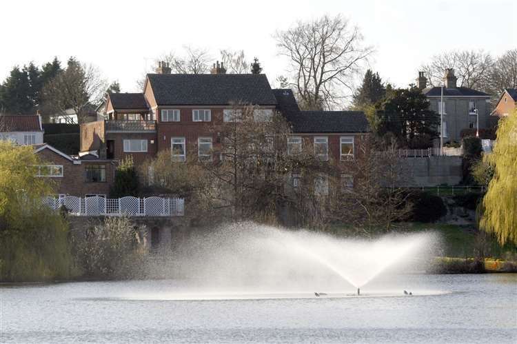 The mere's fountain is being run day and night to help alleviate the problem (38605504)