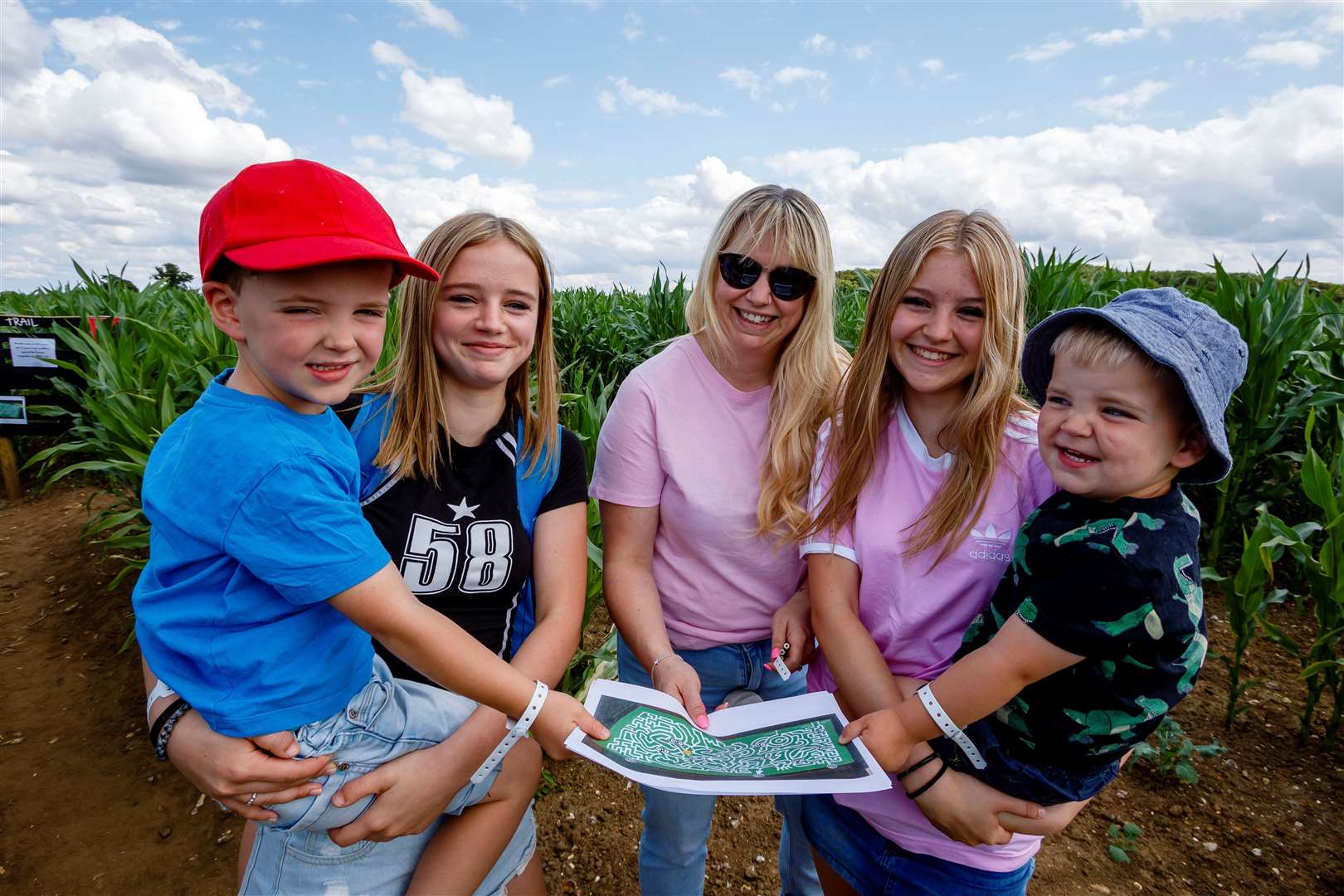 Molly, Emily and Ava Smyth with Seb Kent (far left) and Louie Kent (far right).