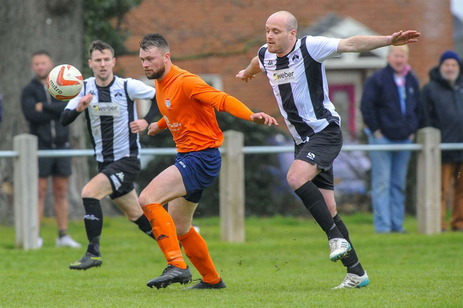 Football action from Harleston Town vs Diss Town FC - Charlie Webb (D) and Andrew Howell (H) ..Picture: Mark Bullimore Photography. (8452727)