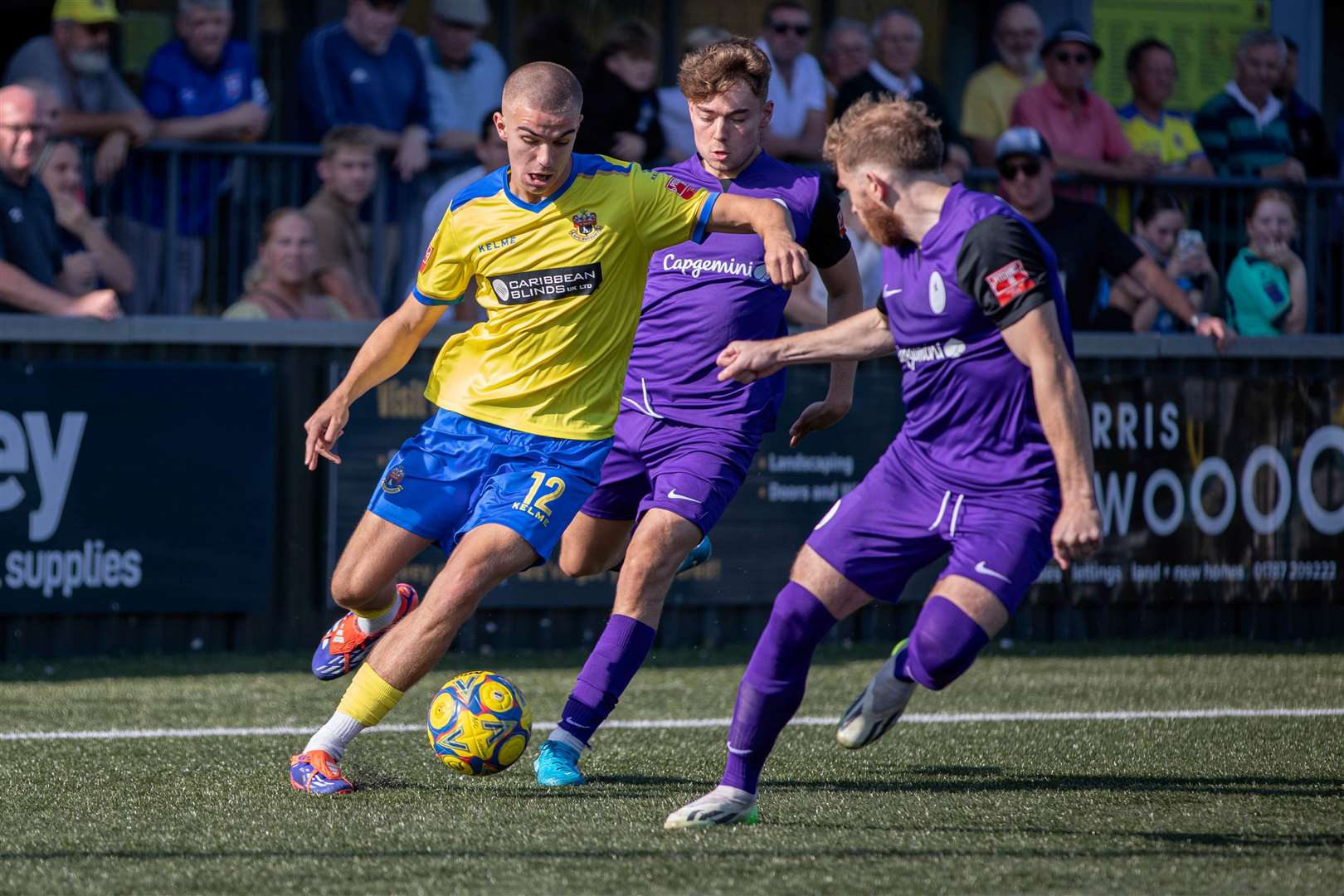 Liam Pearce drives at the AFC Telford defence. Picture: Cameron Screech