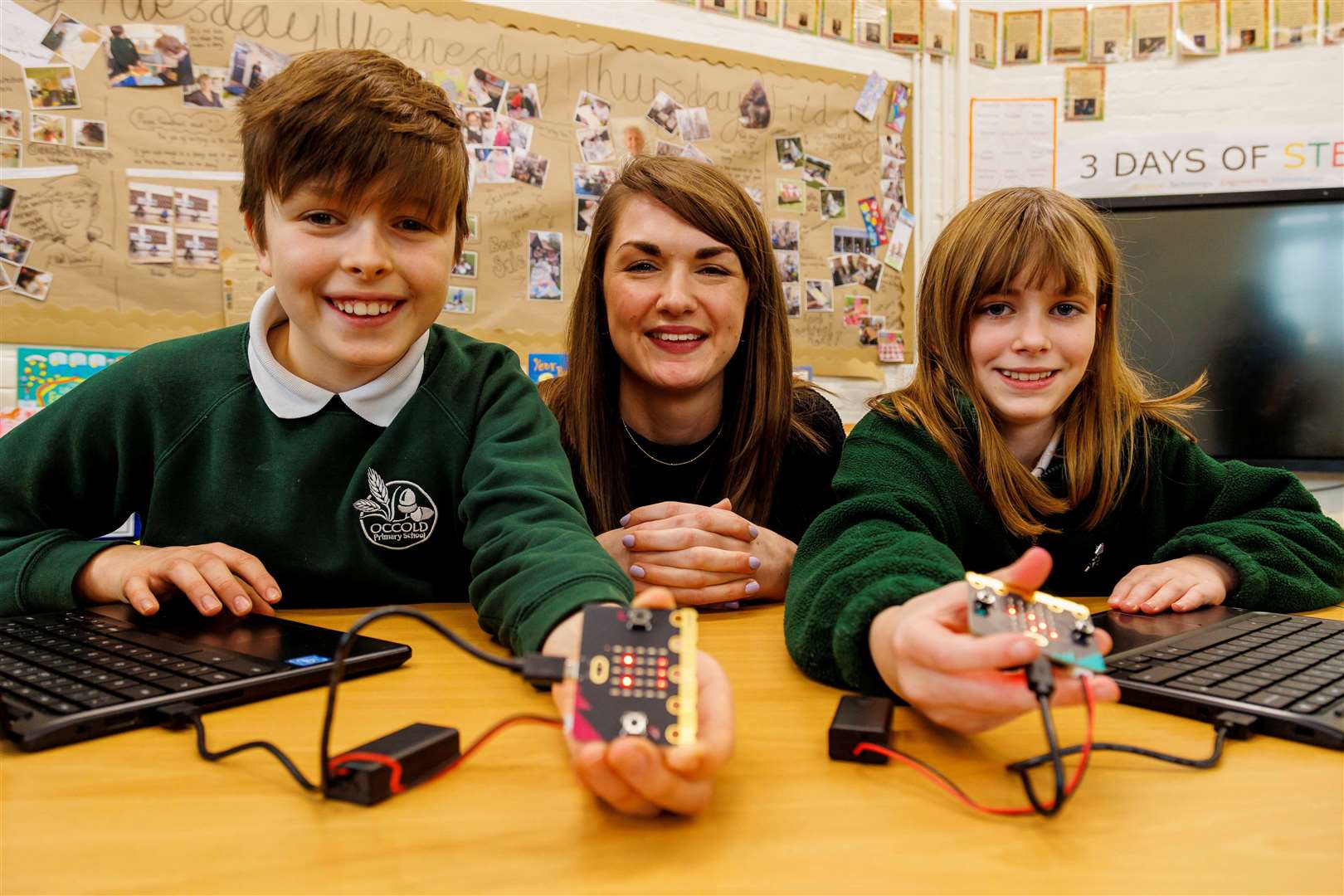 Gabriel, left, and Leah showing some of the technology they have been working with during the STEM sessions. Picture: Mark Bullimore