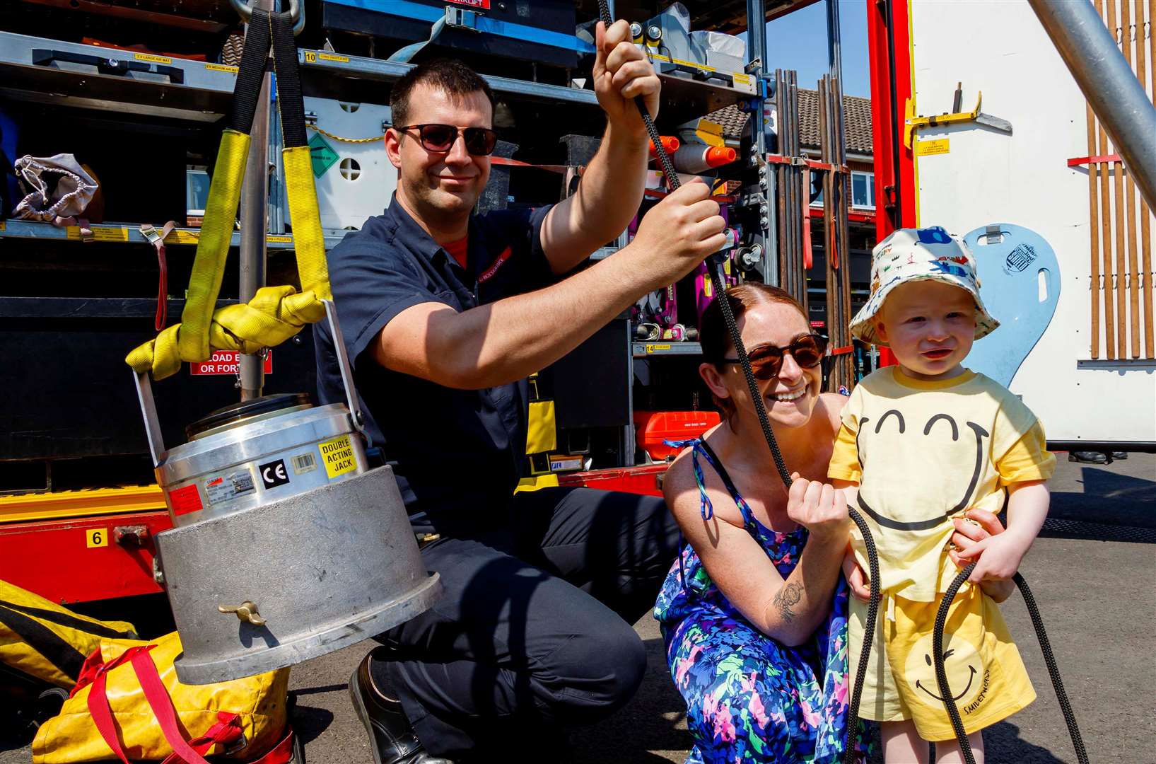 Firefighter Pedro De-Carvalho with Becky and Rex Thorp. Picture: Mark Bullimore