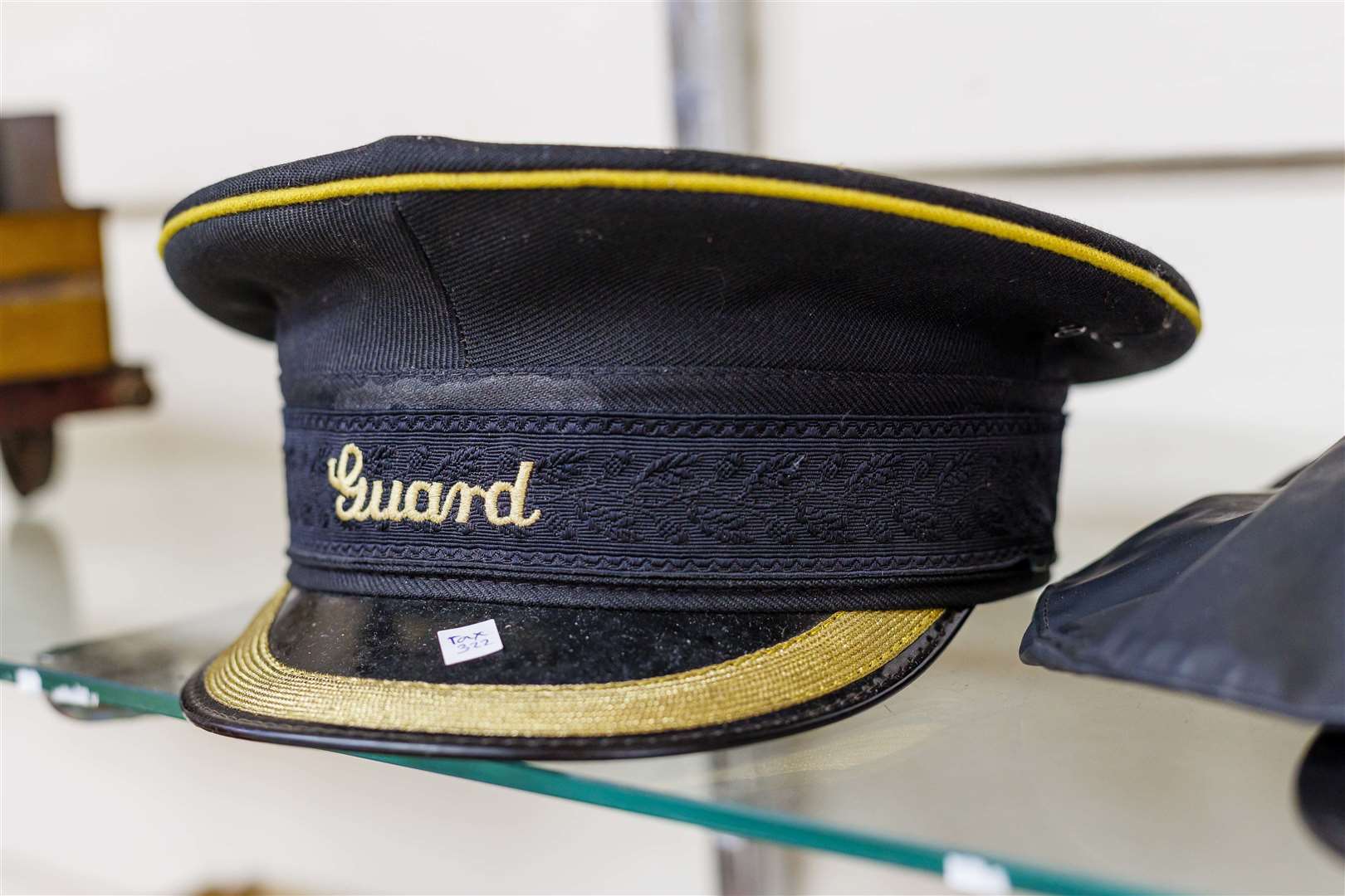 A station guard's hat fetched £25 at last week's auction. Mark Bullimore Photography 2022.