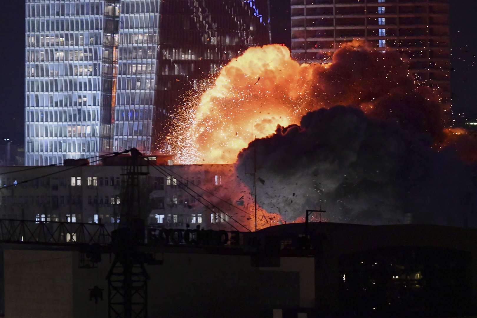 An explosion is seen during a missile attack in Tel Aviv, Israel (Tomer Neuberg via AP)
