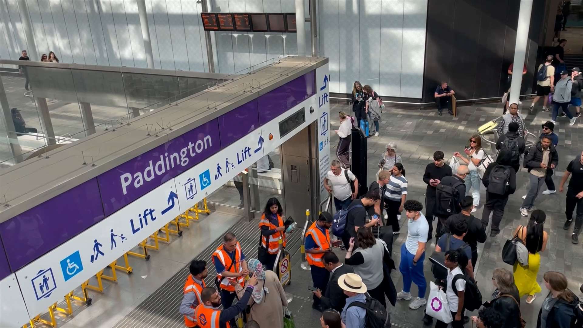 Passengers at Paddington Station in London, after London Underground services were suspended because of power failures (Tom Philpot/PA)