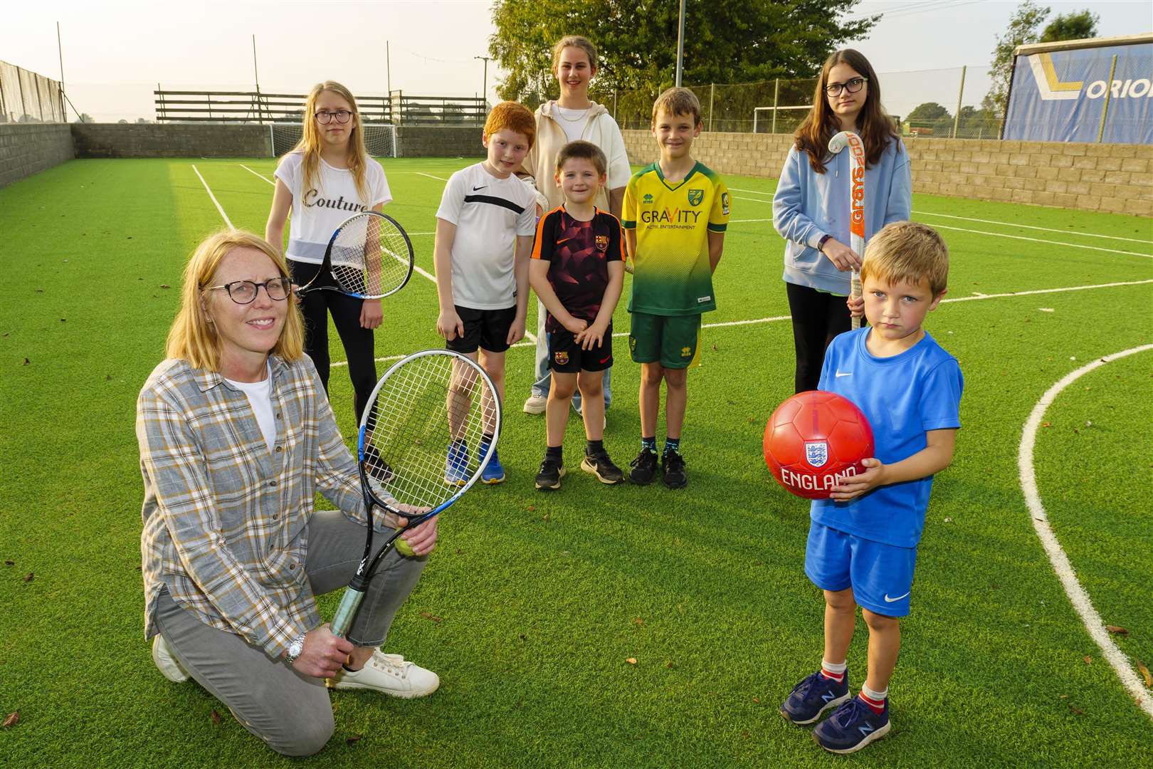 Lucy Kershaw, joined by children at Carleton Rode Jubilee Hall. Picture: Mark Bullimore Photography 2021.