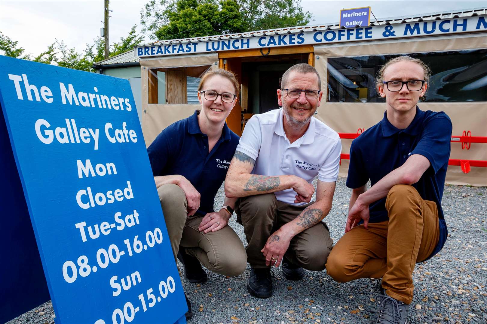 Amy and Glenn Hoddy, with son Ryan Chettle, outside The Mariners Galley Cafe in Rushall. Picture: Mark Bullimore