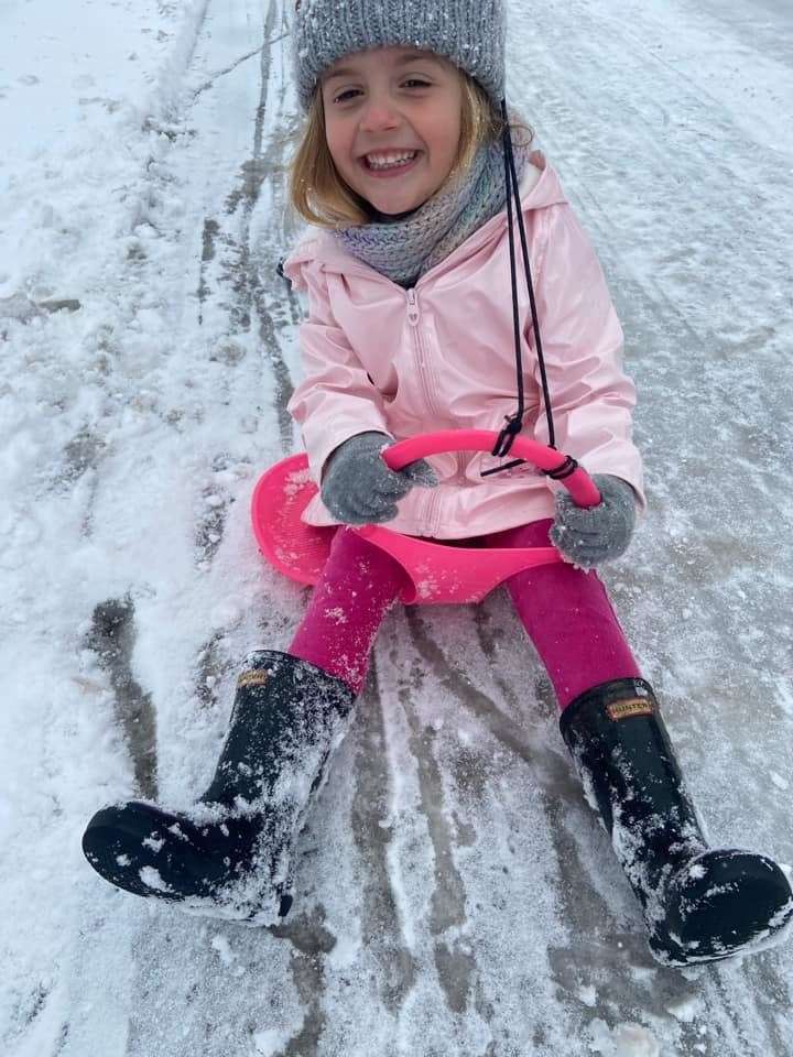 Families enjoy playing in the snow after storm Darcy (44382988)