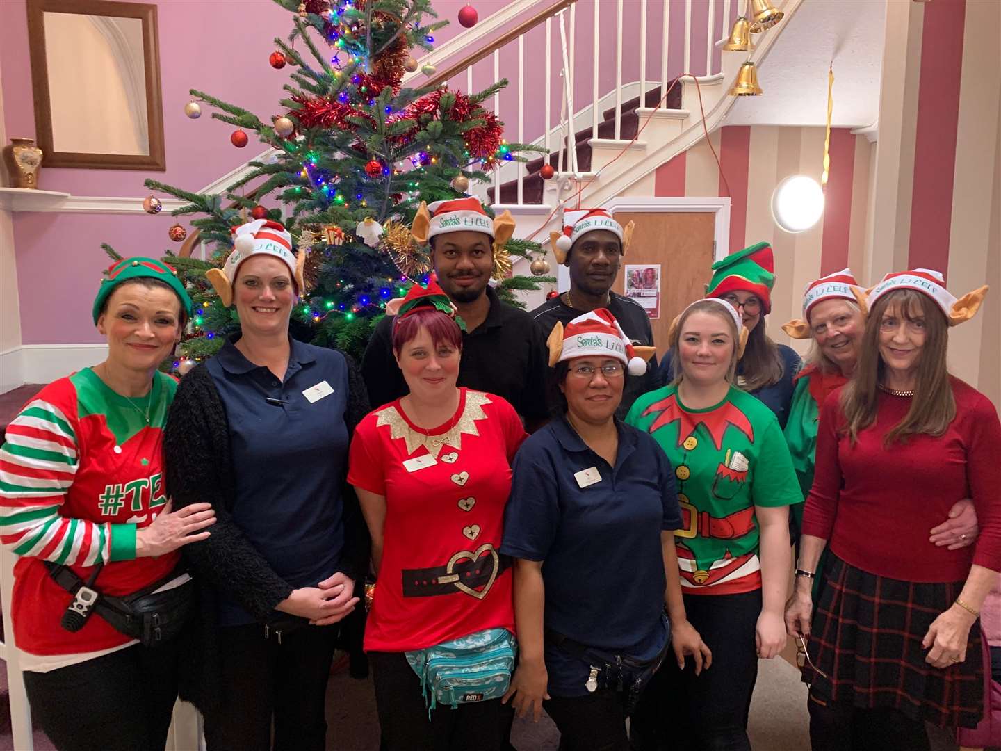 SANTA’S LITTLE HELPERS: Staff at Oaklands Care Home got out their festive gear to raise money for charity.