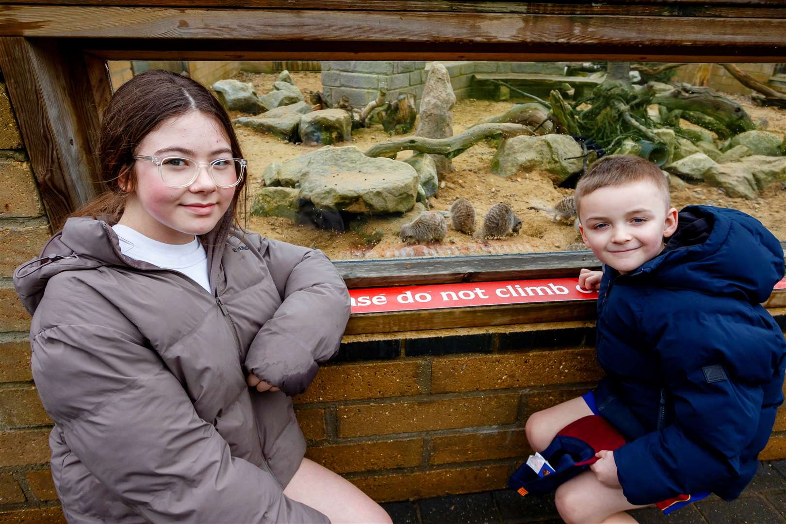 Maisie and Reuben Downs with the meerkats.