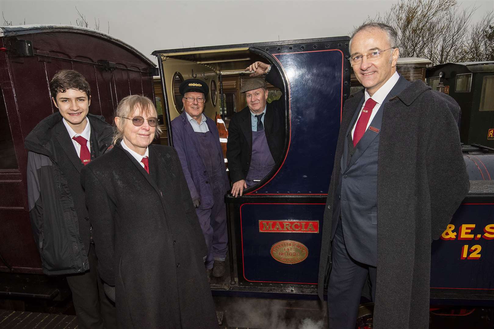 Marcia's drivers Steve Graystone and Nigel Pulman with station staff Corinne Sheard, Danny Leggett and Alex Leggett. Picture by Mark Westley