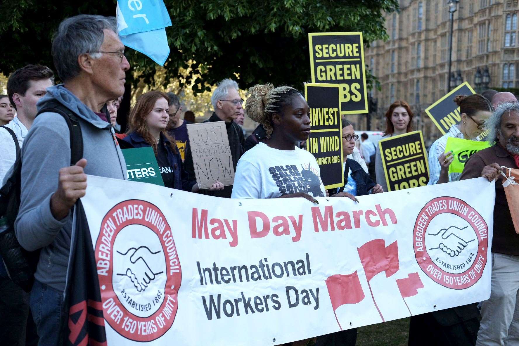 Climate activists and trade unionists join forces outside Parliament (Angela Christofilou/Greenpeace/PA)