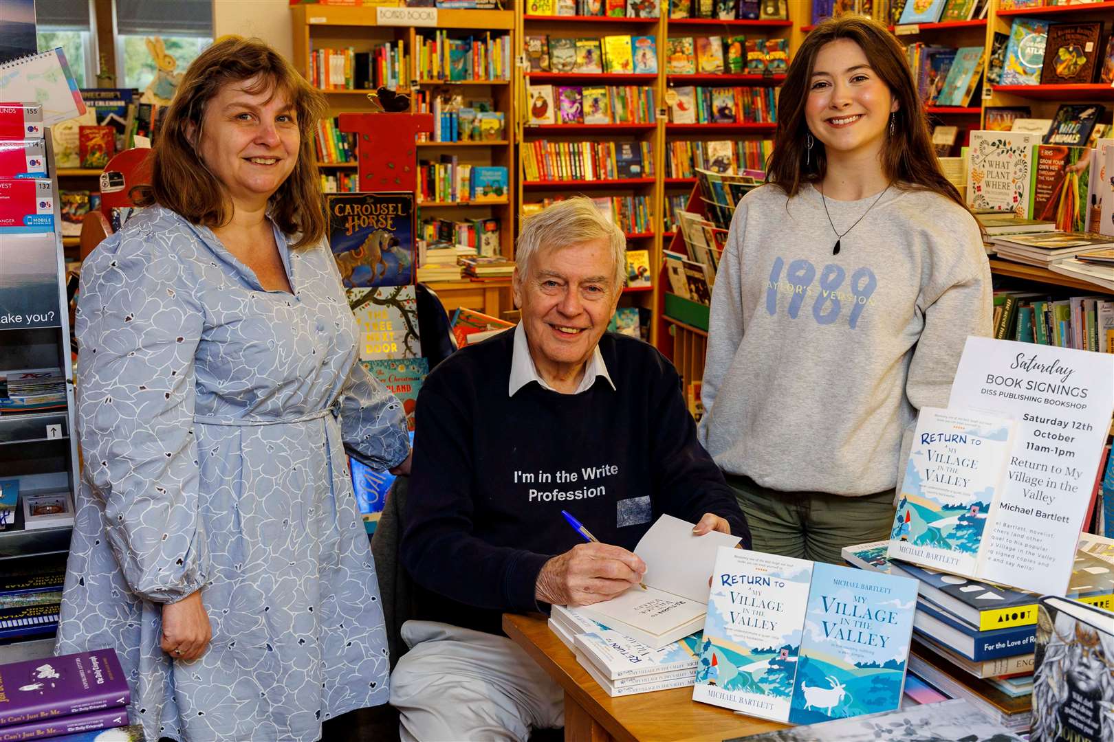 Michael Bartlett with booksellers Karen Pearl, left, and Jasmine Briggs at Diss Publishing.Picture: Mark Bullimore