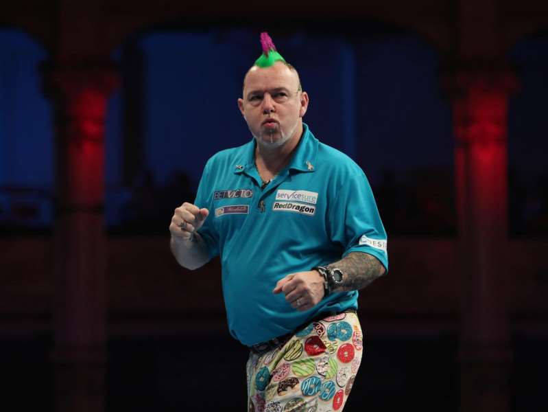 Peter Wright was left celebrating at the end of his quarter-final Picture: Lawrence Lustig/PDC