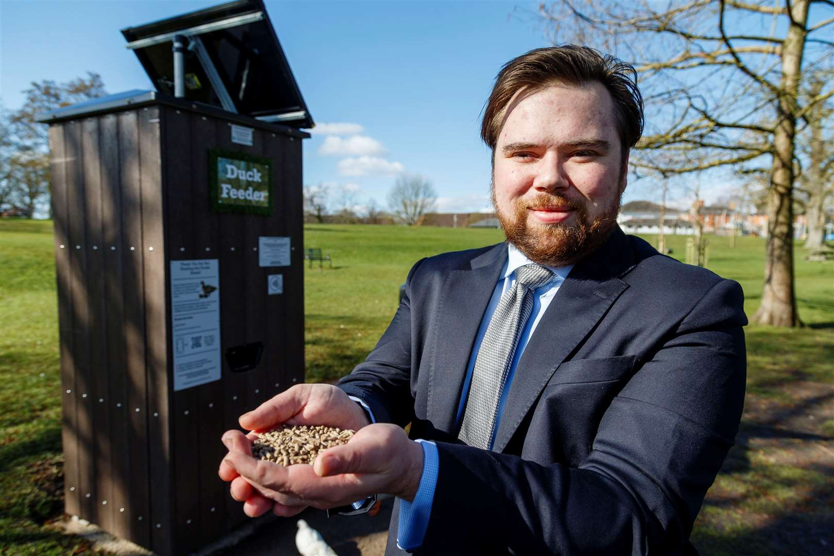 Diss Town Mayor Councillor Kieran Murphy with the new duck feeding station for the Mere. Picture: Mark Bullimore