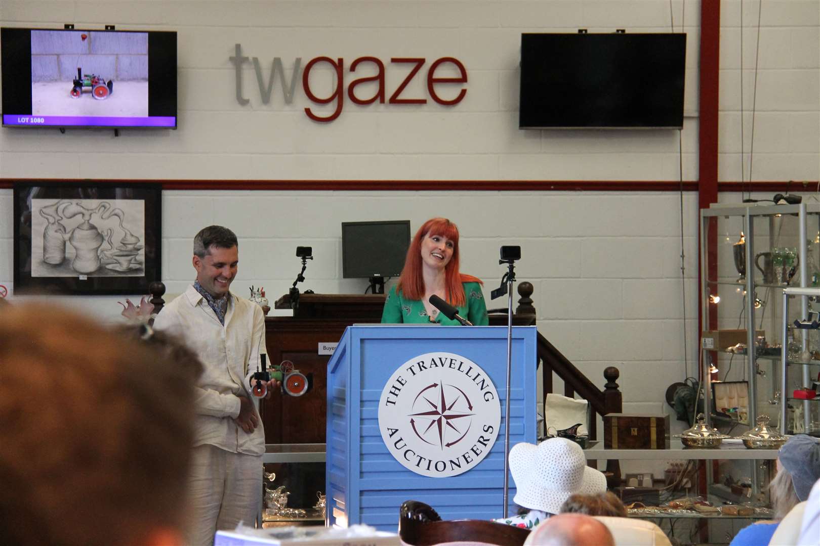 Izzie Balmer and Robin Johnson at The Travelling Auctioneers rostrum. Picture: TW Gaze