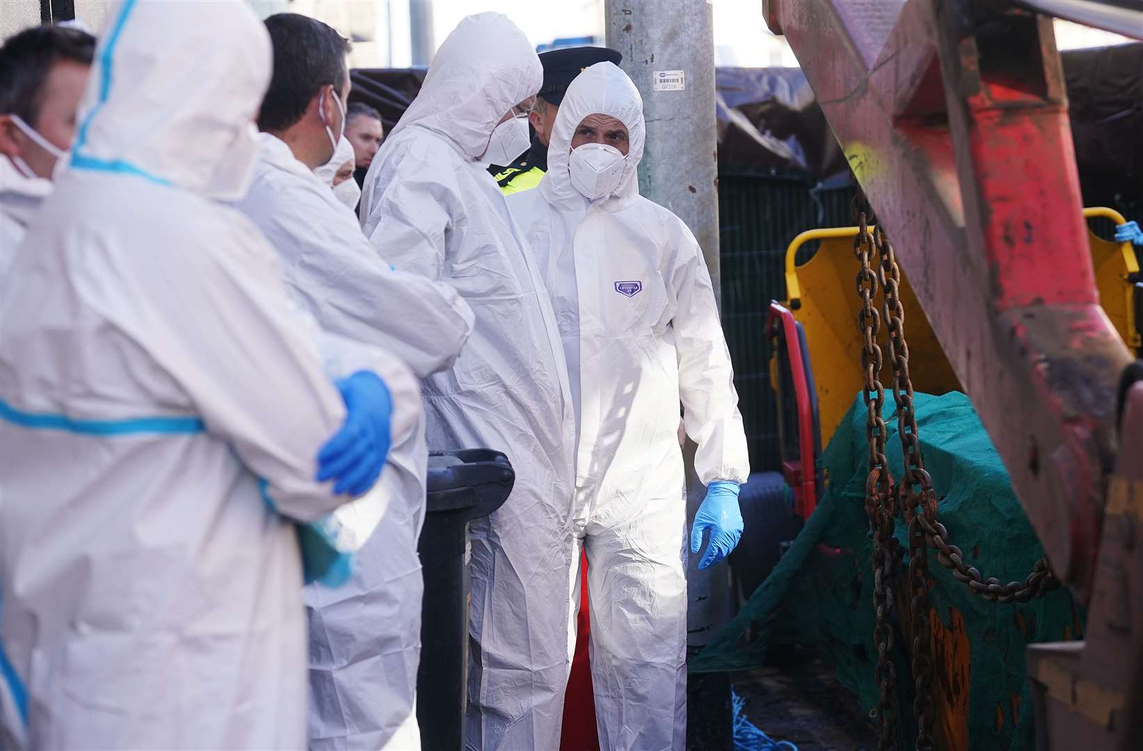 Members of the Garda forensics at the Satchwell property in Youghal, Co. Cork (Brian Lawless/PA)