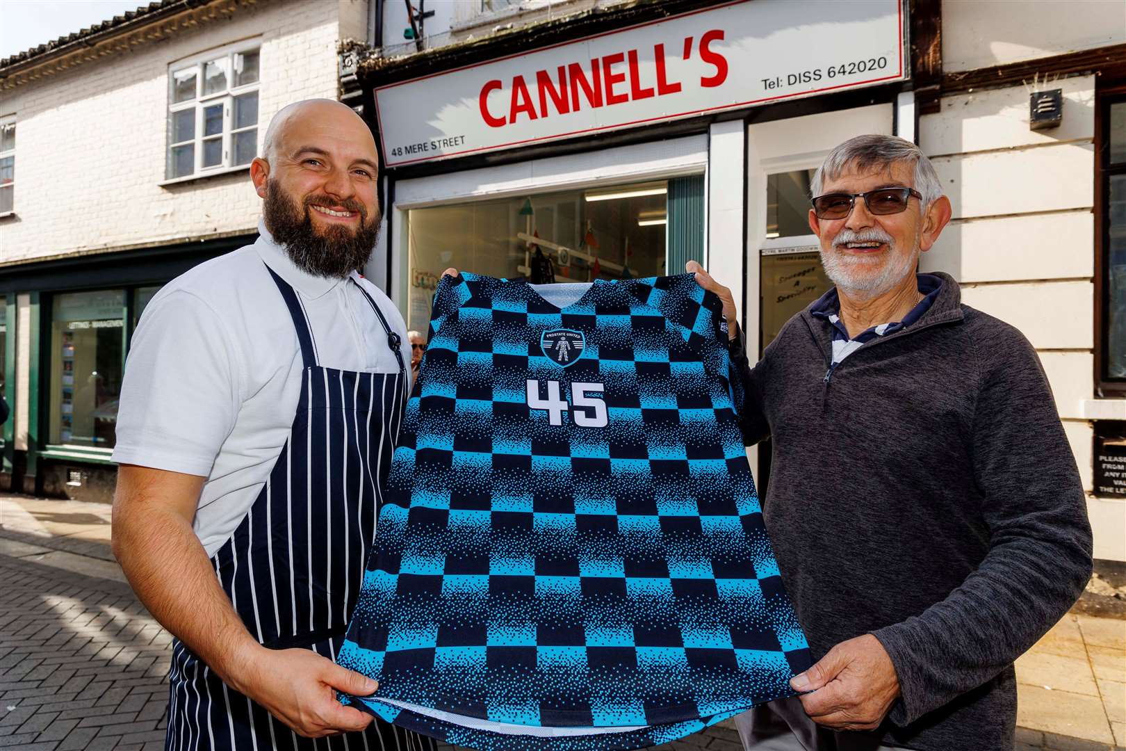 Rob and Cyril Goodwin with a Prostate United shirt – awarded for raising more than £500. Picture: Mark Bullimore