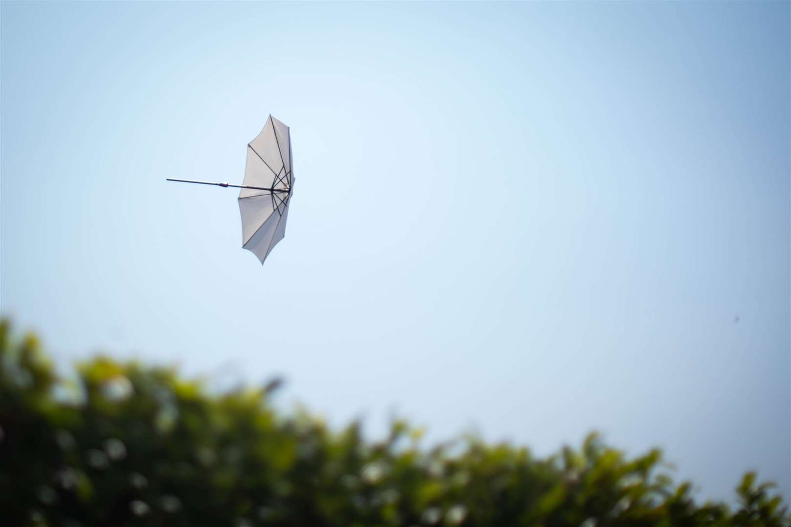 This umbrella, meanwhile, was blown away at Ascot Racecourse as there were still a few strong gusts despite the high temperatures (James Manning/PA)