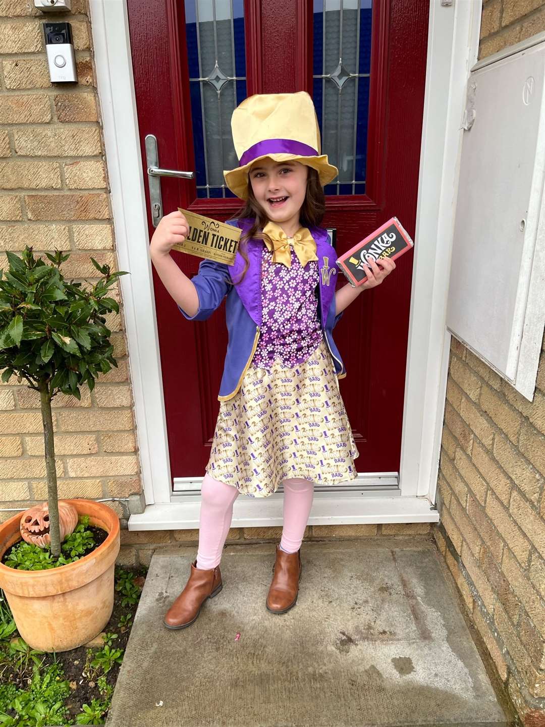 Jessica Endersby, six, from Roydon Primary School, as Willy Wonka.